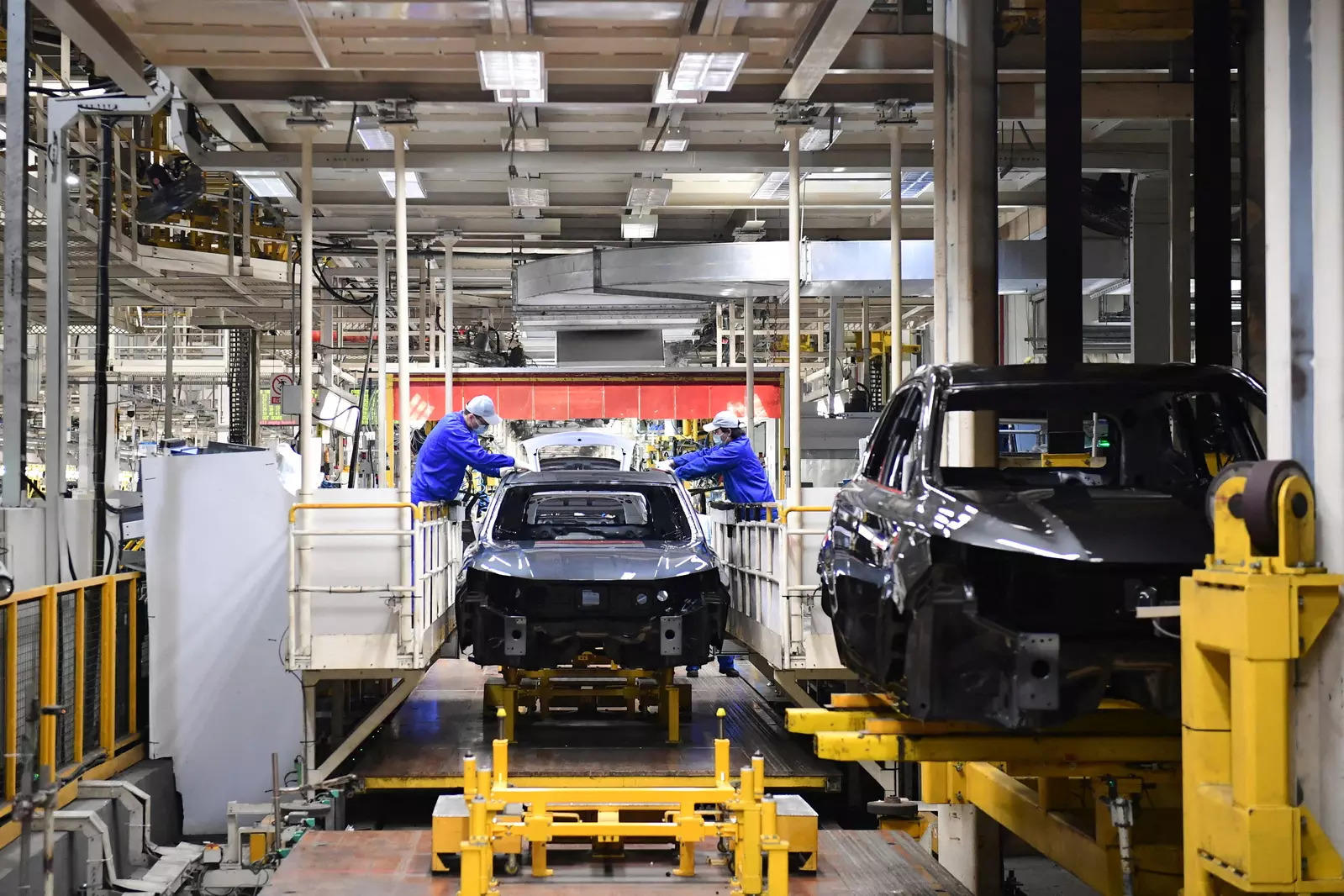 Tesla, key chip makers resume production in Covid-hit Shanghai