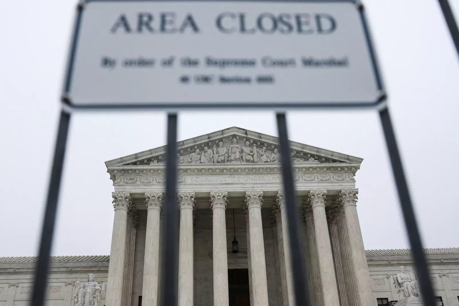  A sign is seen outside the U.S. Supreme Court after the leak of a draft majority opinion written by Justice Samuel Alito preparing for a majority of the court to overturn the landmark Roe v. Wade abortion-rights decision later this year, in Washington, U.S., May 3, 2022. REUTERS/Evelyn Hockstein
