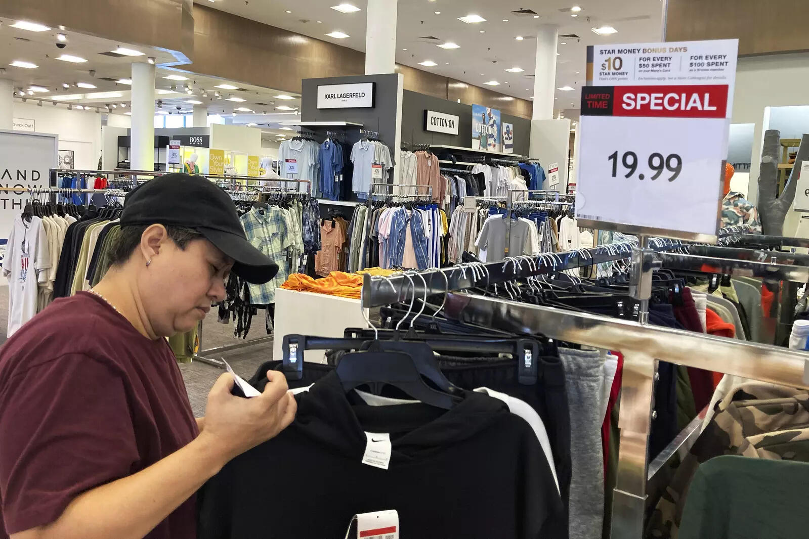 A shopper browses clothing at a Kohl's Corp. department store in