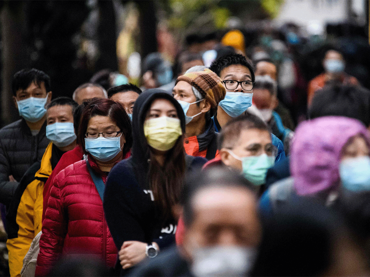 Chinese cities tighten curbs against widening Covid outbreaks