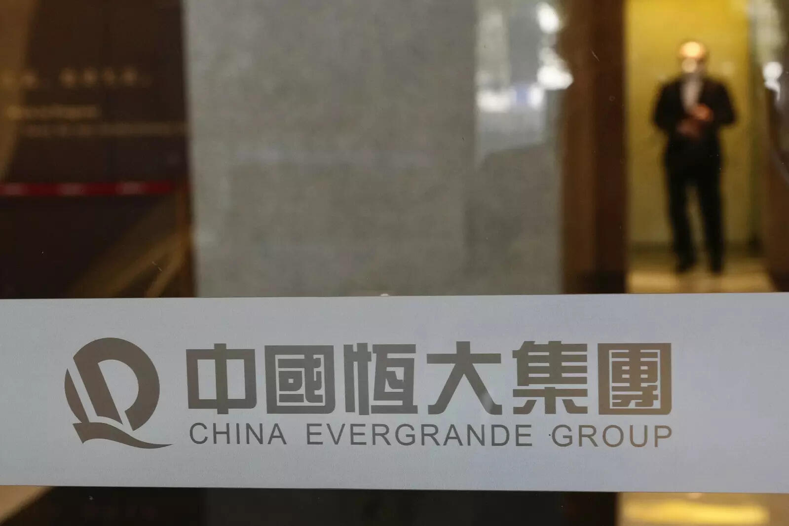 Authorities turn seized home towers at Evergrande's resort island to rental, commercial use