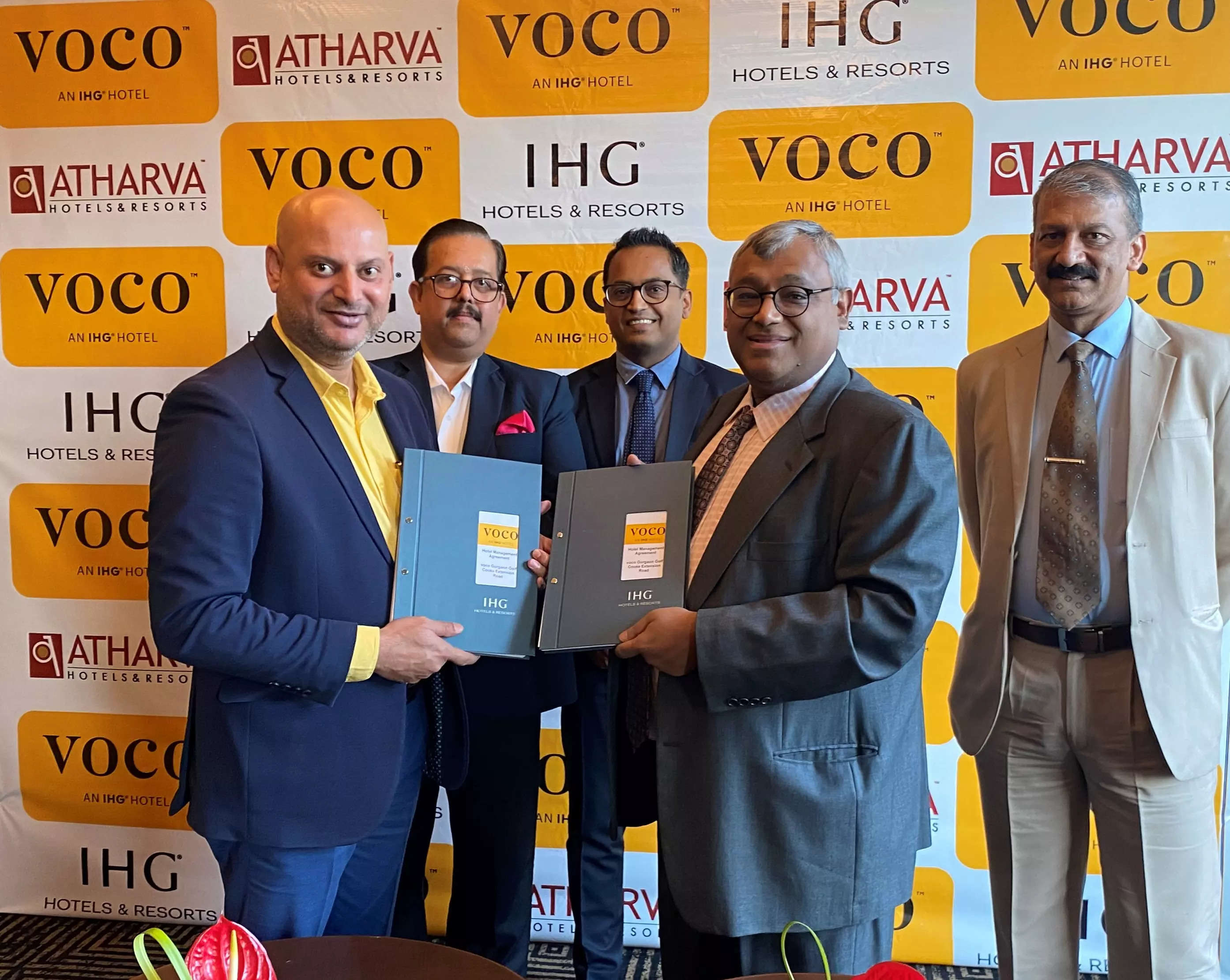     MoU signing between Prawal Choudhary, chairman, Atharva Hotels & Resorts (left) and Sudeep Jain, MD-South West Asia, IHG Hotels and Resorts for a 206-room VOCO in Gurugram.  Also in the frame are Deepak Jha, MD, Atharva Hotels & Resorts;  Nishant Kumar, director - Development, IHG Hotels & Resorts and Ranjit Mundle, CEO, Atharva Hotels & Resorts.