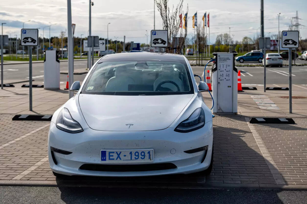  The Tesla traveled 550 feet (167.64 m) before departing the road on a curve, driving over the curb, and hitting a drainage culvert, a raised manhole, and a tree and catching fire, the NTSB said.