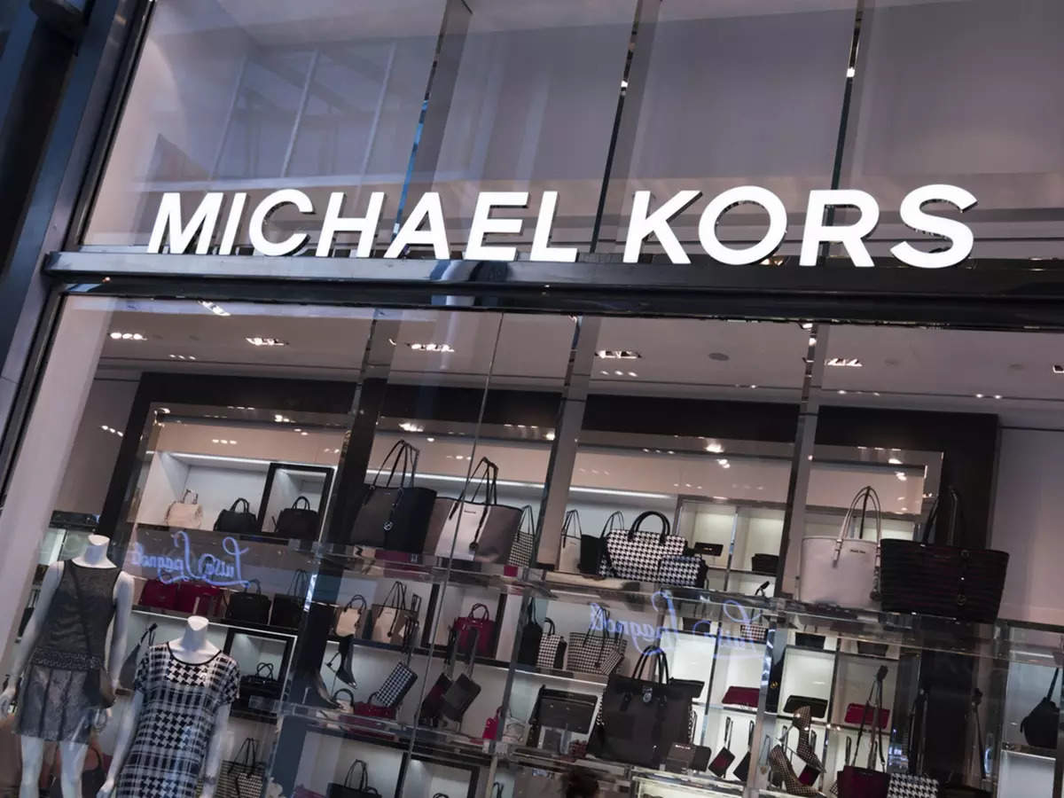 Michael Kors owner Capri cuts forecasts as demand slows, shares plunge 24%,  ET BrandEquity