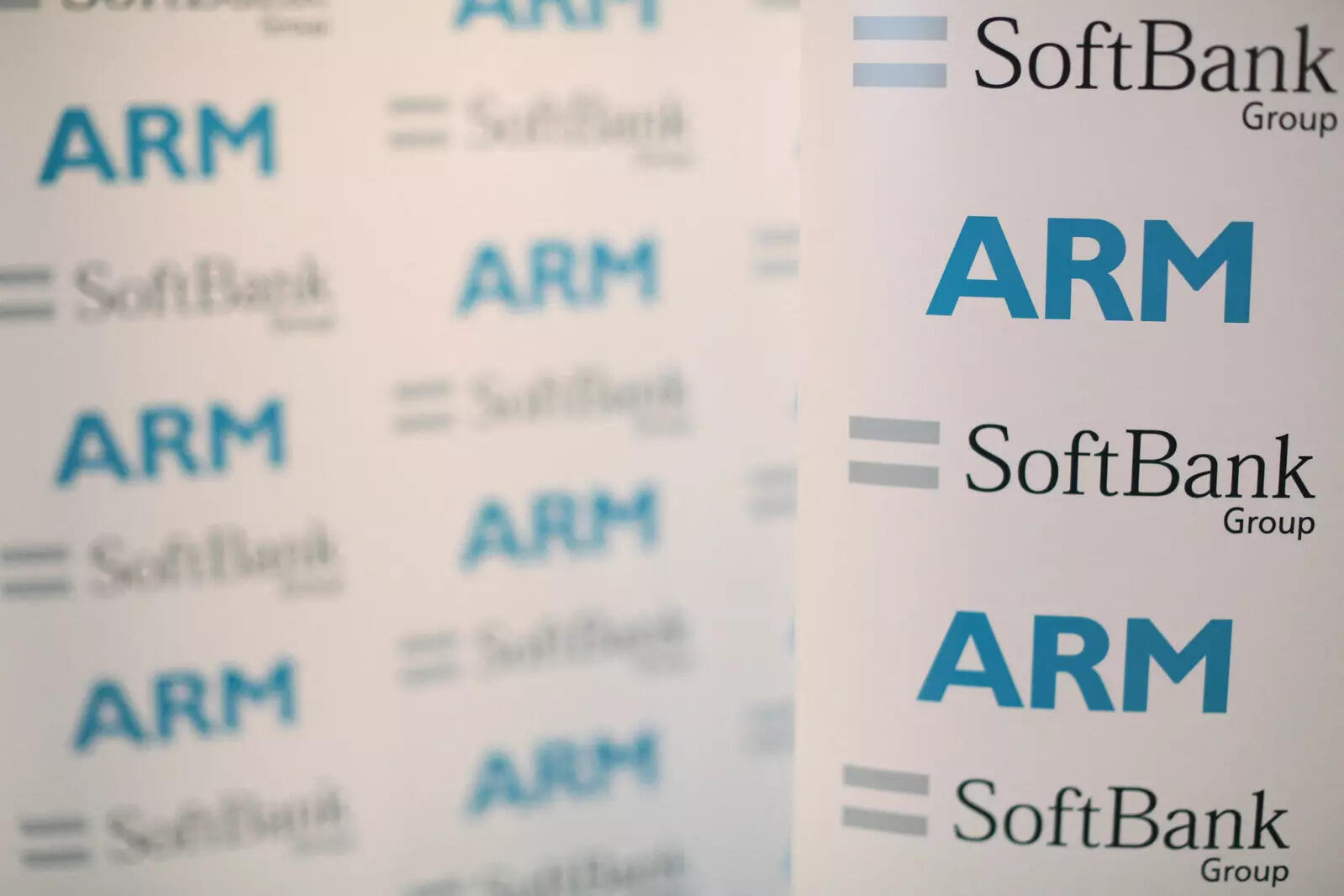  FILE PHOTO: An ARM and SoftBank Group branded board is displayed at a news conference in London, Britain July 18, 2016. REUTERS/Neil Hall/File Photo