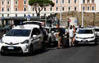 Tourist deluge, heatwave lay bare Italy's taxi shortage