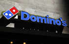 Domino's Pizza cuts store openings, misses sales estimates; shares fall