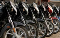 Hero slashes price, Bajaj flags flattish growth in entry-level bikes as inflation pinches rural incomes