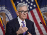 fed holds rates steady flags lack of further progress on inflation