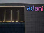 six adani firms get sebi show cause notice