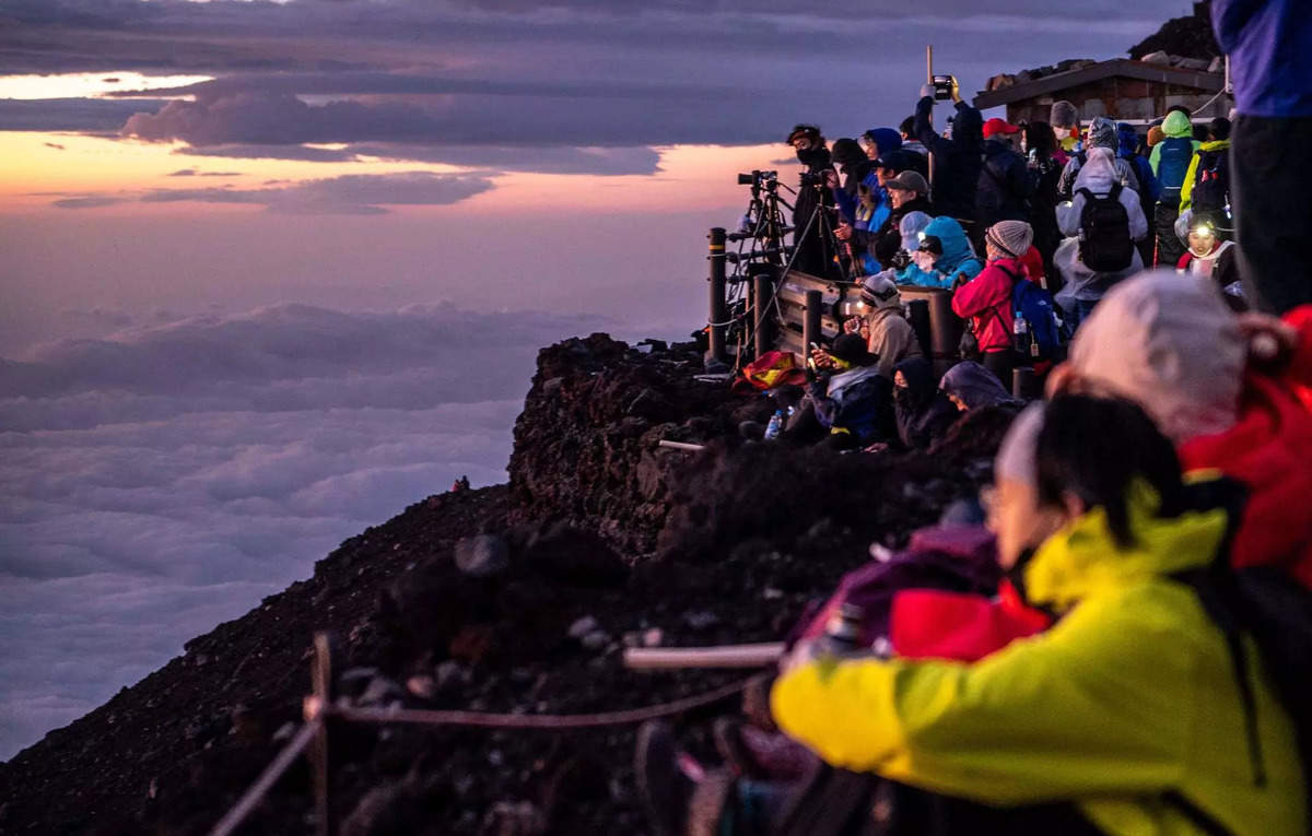 Japanese officials call for Mount Fuji crowd control, ET TravelWorld