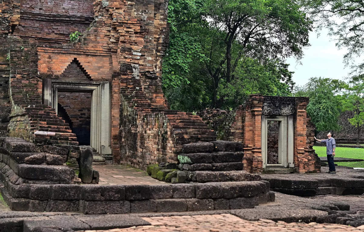 Thai archaeologist Tanachaya Tiandee explores the ancient town of Si Thep under the scorching sun