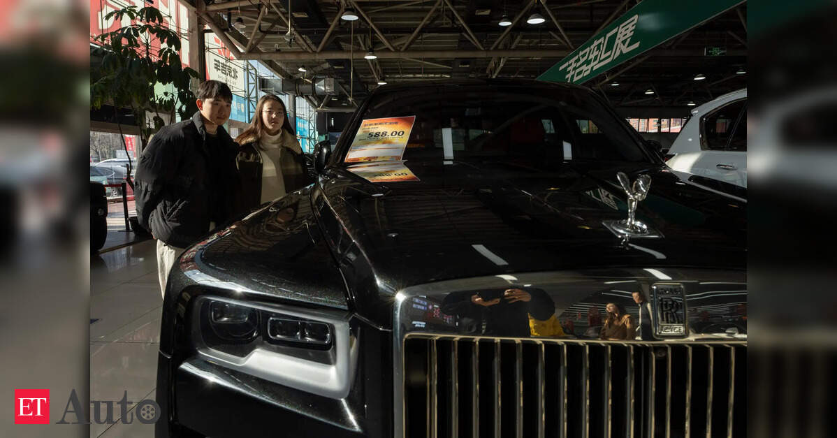 High-end car sales sink in China as its economy slows, taking a toll on European automakers