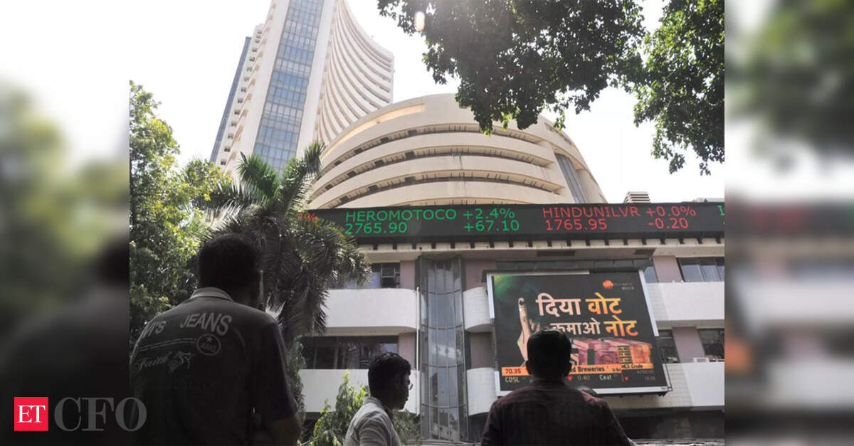 Indian shares open flat as oil slide offsets drop in IT after Fed decision