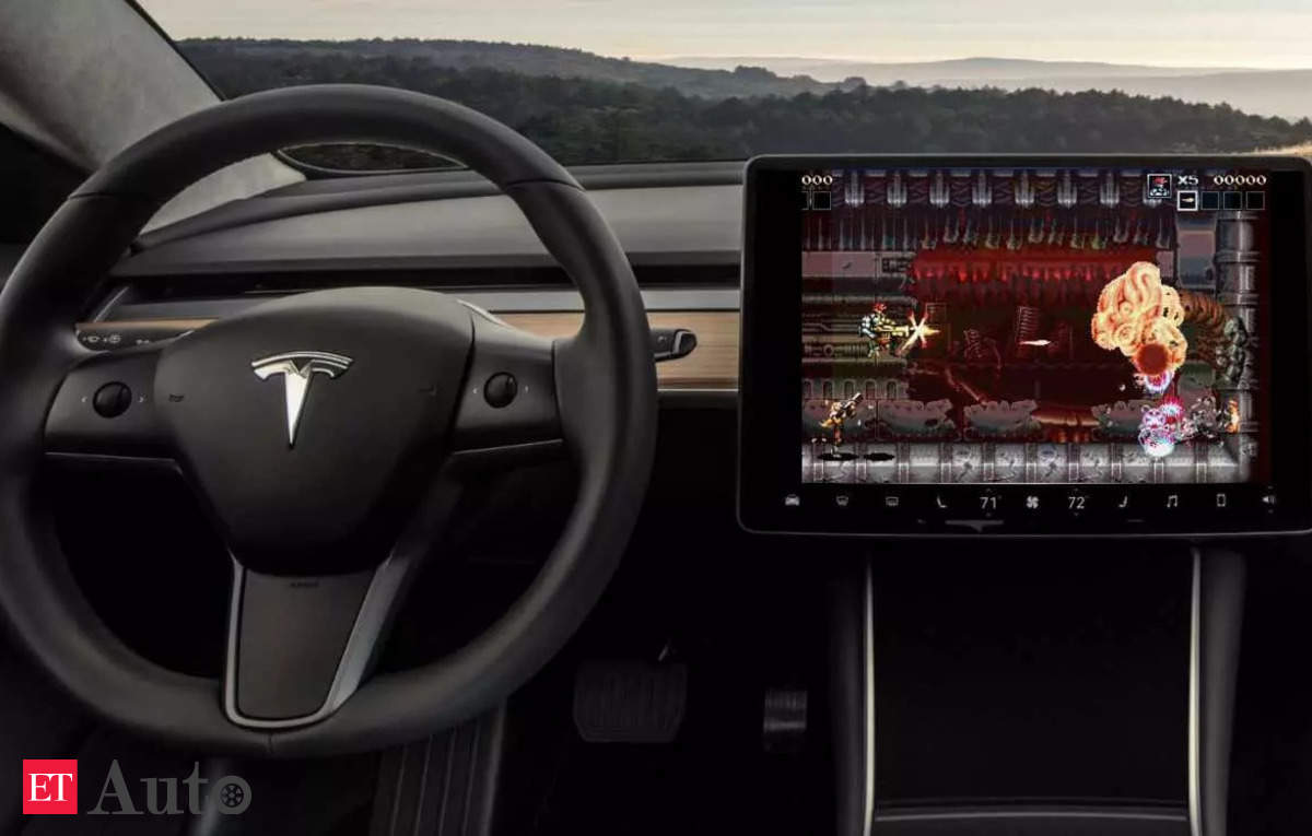 Tesla in-car video games raise drivers safety concerns, Auto News, ET Auto